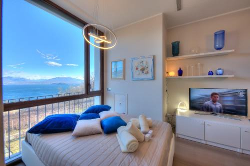 Meina Apartamento | Suite on The Lake - Happy Rentals