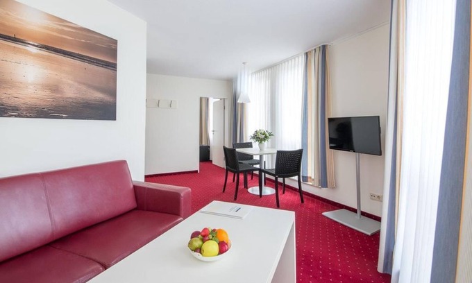 Norderney Casa | Suite (up to 2 pers.) shower/WC buffet breakfast - Michels Strandhotel Germania