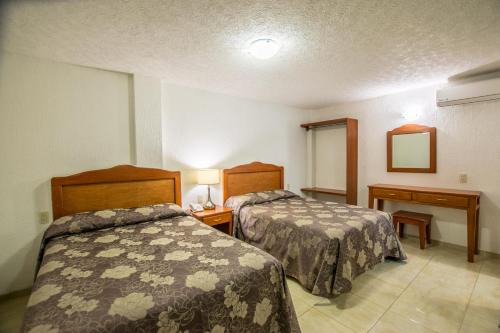León Hotel | Suites Poliforum Inn