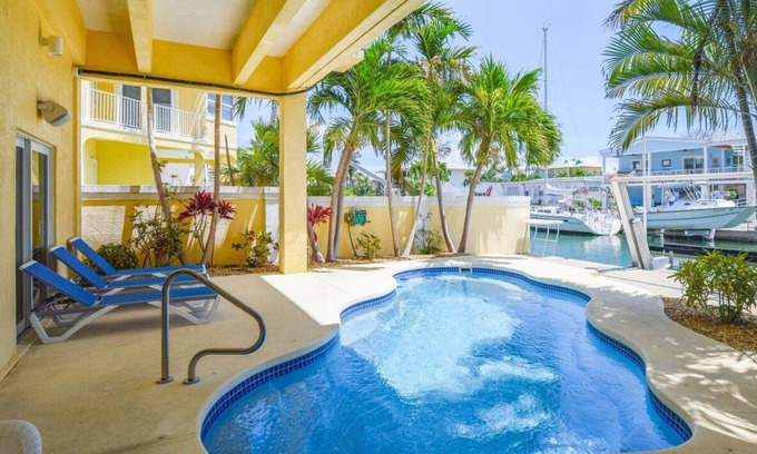 Summerland Key Casa | Summerland Airport Hangar Home with Pool, Private Runway and deep wide Canal