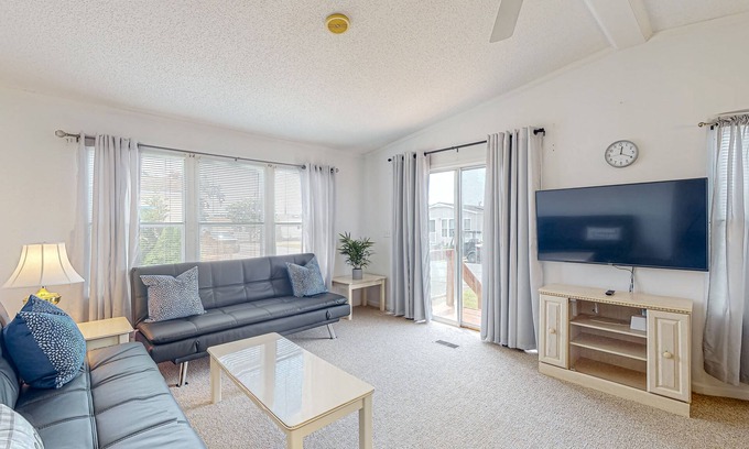 Assateague Pointe Casa | Sunny coastal home with private patio, on-site pool, central AC, & W/D