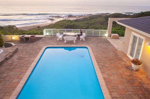 Umzumbe Casa | Sunrise on Stiebel Rocks