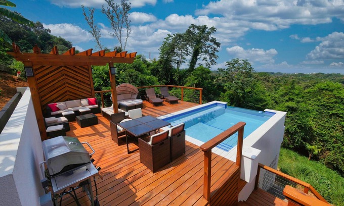 Sandy Bay Casa | Sunset and Ocean views at Sandy Feet Retreat with private infinity pool.