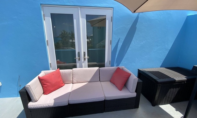 Crawl Hill Apartamento | Apartamento Sunset Paradise de un dormitorio para 4 personas cerca de la playa con vista al mar WiFi GRATUITO