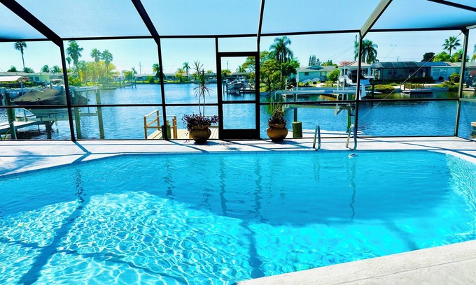 Port Richey Casa | Sunset Shores, 2/2 pool canal home with Gulf access in nice quiet neighborhood