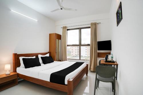 Bengaluru Hotel | Super Collection O K R Puram Manyata
