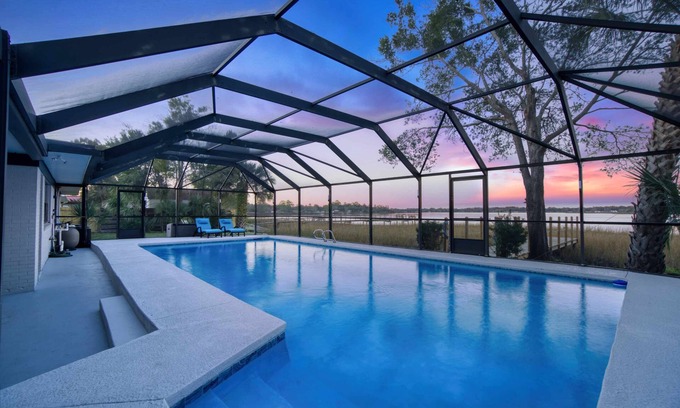 Northside Casa | Super Mario's Riverside Hideaway: Unique Family Fun with Pool & Games