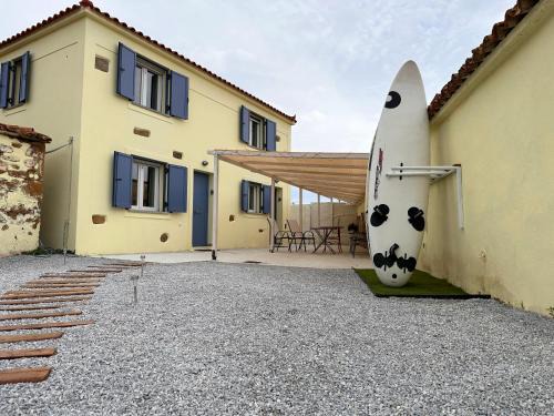 Lemnos Casa | Surf-themed stone house at Kalliopi 2