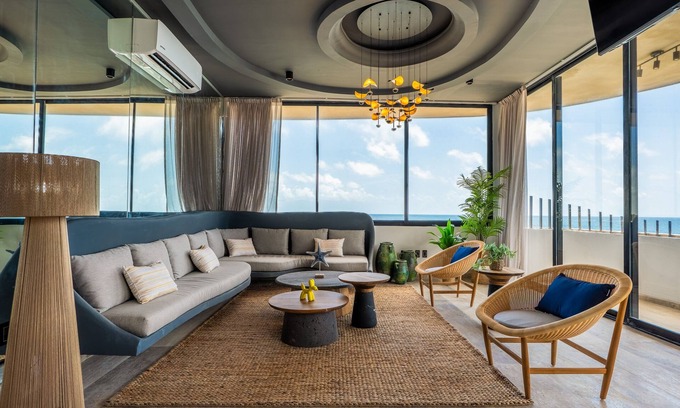Tulsayab Condominio | Surreal coastal apartment with local design, shared pool & private jacuzzi
