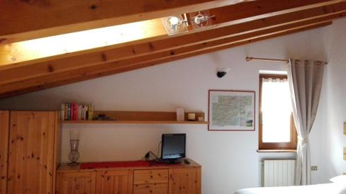 Songavazzo Casa | Sweet Home Casa Vacanze "La Mansarda"