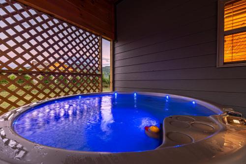 Cosby Casa | Sweet Mountain Memories Relax affordably cozy cabin with hot tub, game room, and mountain views!