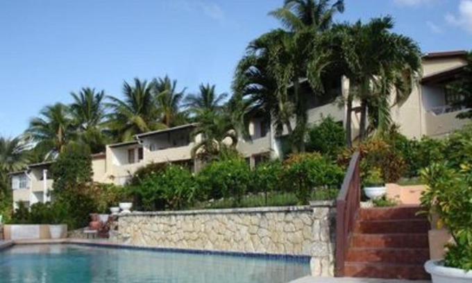 Dickenson Bay Apartamento | Swimming Pool- Balcony Veranda- Sea & Sunset Views