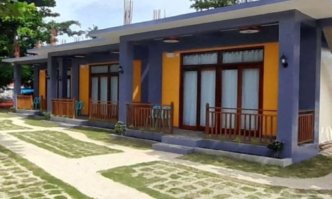 Catangnan Complejo | Takbo Beach Resort - Cabana 2- Two Queen Size Beds with amenities