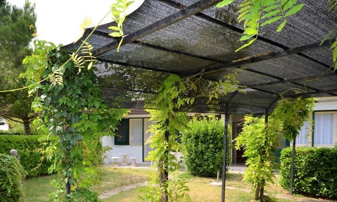 Bibione Villa | Tómese un descanso en nuestra hermosa villa con jardín privado de Beahost Rentals