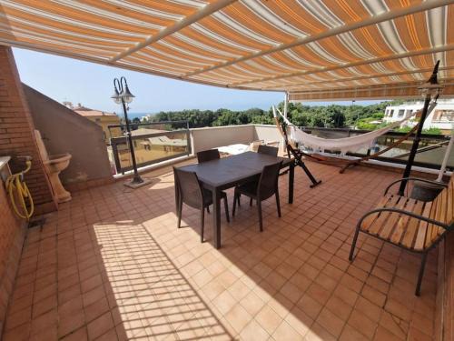 Nettuno Casa | Terrazza a Nettuno e Chiesa Giubilare Santa Maria Goretti