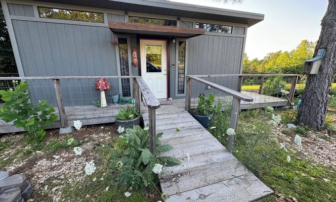 Pineville Cabina | The Adventure Center rustic tiny cabin hot tub access stage stars sunsets & pets