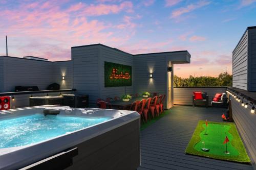 Katie Hill Neighborhood Casa | The Americana Abode Rooftop Hot Tub Game Room
