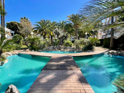 Platja de l'Arenal Apartamento | THE BEACH HOUSE PLAYA DEL ARENAL Jávea - Pool and Garden Steps from the beach