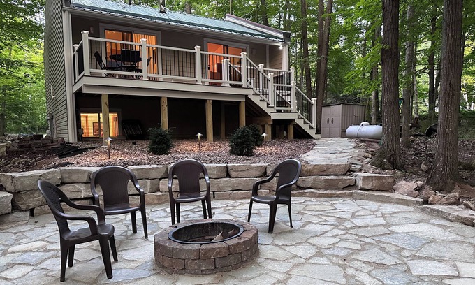 Egg Harbor Cabaña | The best patio and firepit at The Cat's Lair in the woods! Level 2 EV charger!