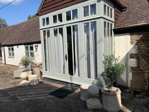 Frilford Cama Y Desayuno | The Byre, barn conversion king suite