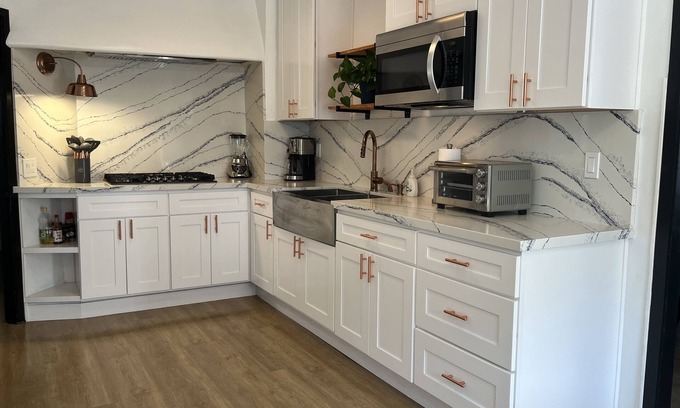 Downtown Riverside Casa | The Charming House of Riverside: All King beds, 55" Smart TVs, W/D, Downtown
