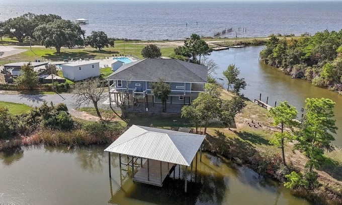 Ocean Springs Cabaña | The Fin & Feather. A Gorgeous Seaside Cottage.2 docks. An incredible experience!