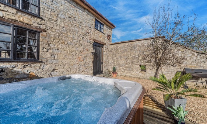 Ilton Cabaña | El Granero Granero convertido en un hermoso Rural Ubicación, bañera de hidromasaje, 4 estrellas clasificado