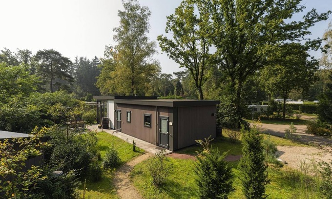 Lieren Casa | The Heide Lodge offers a luxurious and comfortable holiday experience on a spacious plot with a private garden and excellent amenities.