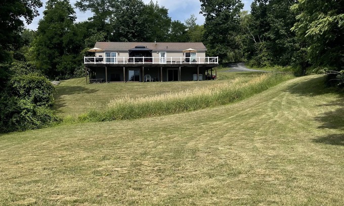 Catskill Casa | The Hideaway in the Catskills. Sprawling field and game room.