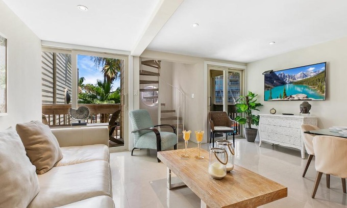 South Padre Island Casa | The ocean waves are calling! Relaxing setting with pool view in beachfront resort
