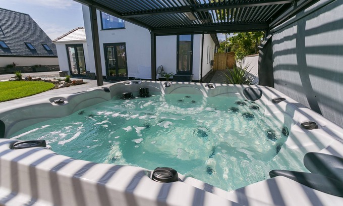 Trearddur Bay Cabaña | The Old Abbey - a hot tub that sleeps 16 guests in 6 bedrooms