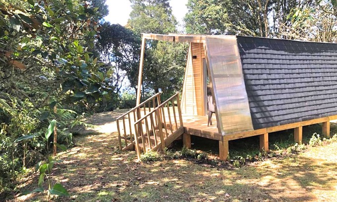 Guarne Cabina | The Shire Glamping - nestled among lush trees, tranquil atmosphere