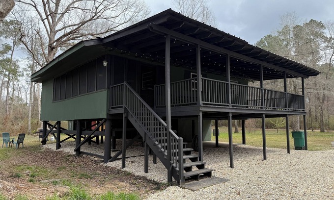 Fluker Casa | The Woods Camp w/ fire pit, propane grill, and waterfront view on the River
