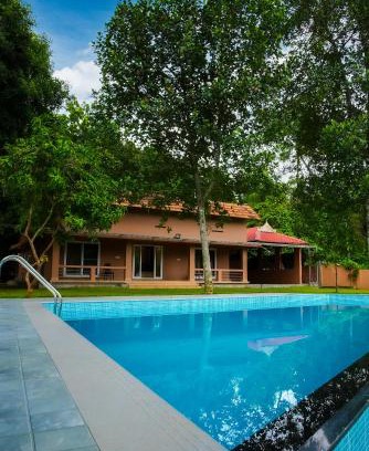 Irinjalakuda Casa | Theeram Riverside Holiday Home