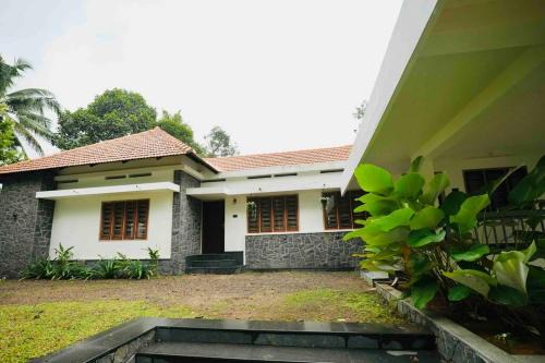 Perumbaikad Apartamento | Thekkaniyil Homestay
