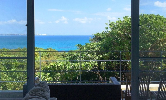 Higashionna Casa | Theme Suite 101 Overlooking the sea A modern mansion designed by an architect and a photographe / Uruma Okinawa
