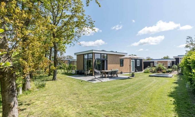 Burgh-Haamstede Casa | This attractive chalet is located in a beautiful location at the back of Schouwenduin, surrounded by