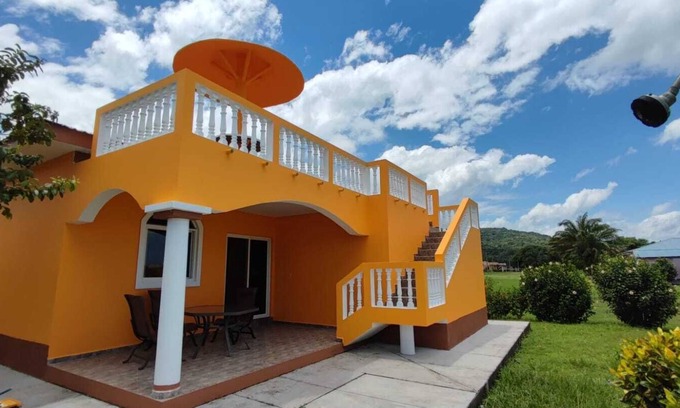 Colon Casa | This Hidden paradise located right on the Caribbean Ocean & big tall Mountains.