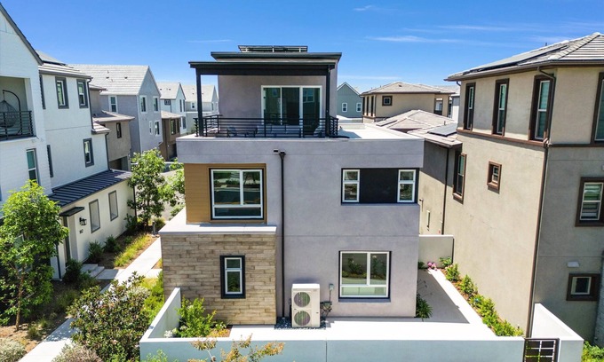 Irvine Casa | this newly built, fully furnished tri-level home awaits your arrival.