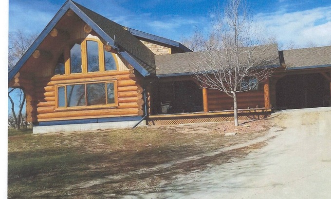 Swift Current Casa | Three level Log Home on Private 40 Acre Estate.