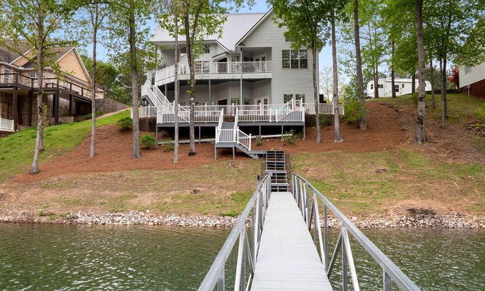 Houston Casa | "TICKET TO PARADISE" - Multiple decks to spend time enjoying the views of the lake.