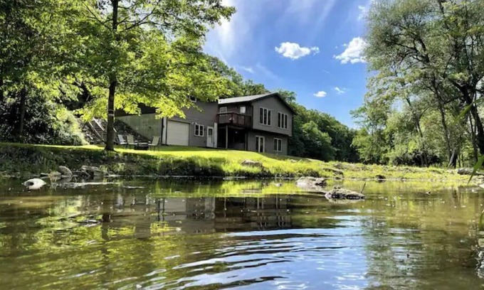 Westby Casa | Timber Coulee Creek in backyard, king size bed, grill on deck, large garage.