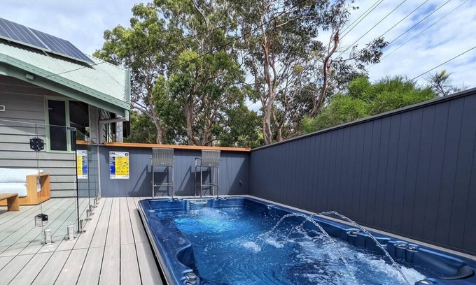 Boomerang Beach Casa | Timeless house with heated spa pool, walk to beaches.
