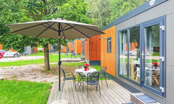 Riedenburg Casa | Tiny Haus Sunside Gardenlounge by Interhome