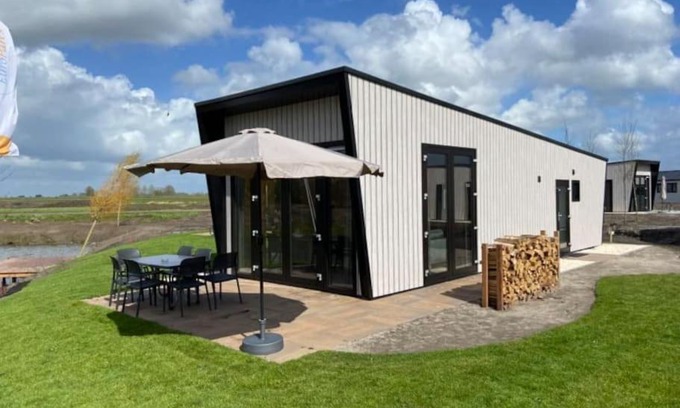 Kampen Casa | Tiny vakantiehuis aan het water met eigen steiger en airco