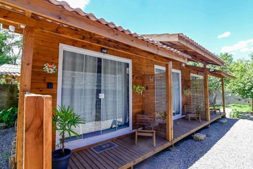Ratones Casa | TinyHouse perto Jurerê In c A/C Fire TV 3