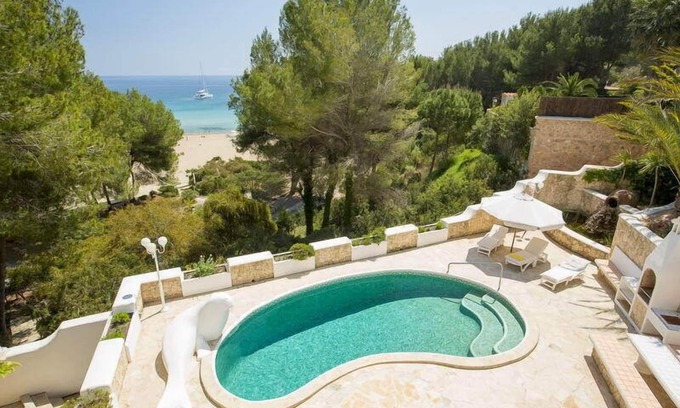 Santa Eulalia del Río Casa | Casa de vacaciones superior con piscina directamente 1. Línea en la playa - única en Ibiza