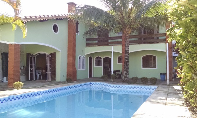 Balneario Arpoador Casa | Casa adosada con piscina a 500 metros de la playa con wifi gratis y TV por cable.