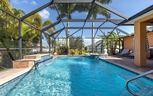 Diplomat Casa | Tranquil Palms Heated Pool Spa Outdoor TV & More