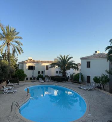 Mazotos Apartamento | Tranquil Poolside apartment with stunning views